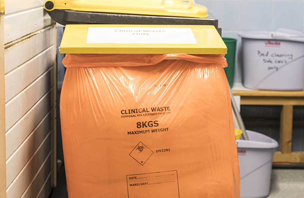 Clinical Waste Bags in orange, yellow and tiger striped, available from Cromwell